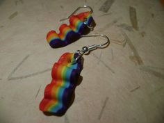 Rainbow Bacon Earrings Bacon measures approximately between 1.5cm to 2.25cm Materials: ▫ Polymer Clay ▫ Hypoallergenic Hanging Earring Hook Each bacon is handmade by me, so you may receive a pair of earrings that are slightly different from the ones pictured in the listing. As they are all made by hand all are similar but no two pairs will ever be the same! I can also do custom orders. Please feel free to send me a message with any questions or ideas! Thanks for checking out my shop! Rainbow Hypoallergenic Earrings As Gift, Rainbow Nickel-free Earrings For Gifts, Nickel-free Rainbow Earrings Gift, Nickel-free Rainbow Earrings For Gift, Adjustable Rainbow Earrings As Gift, Rainbow Single Earring As Gift, Single Rainbow Earring For Gift, Cute Rainbow Hypoallergenic Earrings, Bacon Earrings