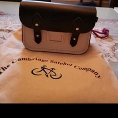 White And Black. One Compartment. Super Cute. Black Strap. Perfect Condition, Never Used Great For A Night Out. Orange Handbag, Red Satchel, Company Bag, Neon Bag, Cambridge Satchel, Brown Canvas, Cambridge Satchel Company, Satchel Handbags, Cleaning Kit