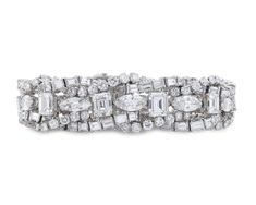 Alternating strands of diamonds totaling approximately 55.04 carats dazzle in this exceptionally rare vintage French bracelet. For centuries, the diamond was thought to possess magical properties. Even today, there is a magic to diamonds such as these, as stones of this quality are extremely scarce. The largest five diamonds weigh 9.19 total carats and are certified by the Gemological Institute of America (GIA) as possessing perfect D color. Two of these stones are also graded as Internally Flaw Luxury Fine Jewelry With Rectangular Stone, Luxury Elegant Rondelle Diamond Bracelet, Luxury Rectangular Diamond Bracelet With Diamond Accents, Luxury Rectangular Jewelry With Diamond Accents, Luxury Diamond Bracelet With Rectangular Diamond Accents, Luxury Antique Diamond Bracelets, Luxury Rondelle Diamond Bracelet For Formal Occasions, Luxury Multi-stone Diamond Bracelet For Anniversary, Luxury Antique Diamond Bracelet