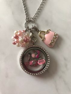 This 30 MM Crystal Locket comes with all the floating charms and charms featured in the photo Magnetic closure Handmade beaded ball charm, purse charm, floating charms Necklace: 30 inches Personalized Round Beads Jewelry For Everyday Use, Crystal Locket, Beaded Ball, Charms Necklace, Floating Charms, Locket Charms, Pink Purse, Purse Charms, Magnetic Closure