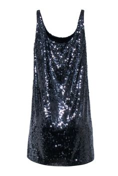 Dazzle the party scene with this sparkling sequin mini dress by Laundry. This dress is perfect for a night out on the town. The navy blue sequins catch the light beautifully and create a fun party-ready look. Style this dress with your favorite pair of strappy heels and chandelier earrings for a stunning and unforgettable outfit. Size 4 Shell 82% Nylon 18% Spandex Lining 100% Polyester Bust 38” Waist 42” Shoulder to hem length 35” Blue Sparkling Sequin Dress For Night Out, Sleeveless Blue Dress For Holiday Party, Sleeveless Contrast Sequin Mini Dress For Holiday Party, Sleeveless Mini Dress With Contrast Sequin For Holiday Party, Sleeveless Contrast Sequin Dress For Night Out, Sleeveless Sequin Dress For Night Out And Party Season, Sleeveless Sequin Dress With Contrast For Date Night, Sleeveless Glitter Dress For A Night Out, Party-ready Sleeveless Dress With Contrast Sequin