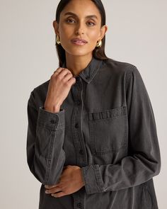 Step up your denim game with our Distressed Denim Oversized Shirt. This effortlessly cool piece combines timeless denim with a modern, laid-back vibe. Its oversized fit offers a relaxed silhouette, making it ideal for layering over your favorite tees or pairing with a skirt for a comfy yet trendy ensemble.  | Quince | Women's Distressed Denim OverSized Shirt in Washed Black, Size Large, Cotton Trendy Washed Black Top With Pockets, Casual Everyday Washed Denim Top, Casual Shirt With Frayed Hem And Relaxed Fit, Casual Washed Denim Top With Relaxed Fit, Casual Washed Relaxed Fit Denim Top, Oversized Casual Denim Top With Frayed Hem, Casual Washed Black Top With Pockets, Casual Relaxed Fit Washed Denim Top, Trendy Relaxed Fit Everyday Denim Top