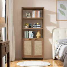 a bedroom with a bed, chair and bookcase