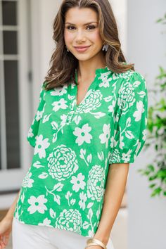 shop the mint, boutique clothing for women, trendy online boutique Green V-neck Top For Day Out, Green Printed V-neck Top, Casual Green Printed Blouse, Casual Green Split Neck Top, Green V-neck Top For Vacation, Green Split Neck Top For Spring, Summer Floral Print Blouse With Split Neck, Green Printed Spring Tops, Summer Floral Print Split Neck Blouse