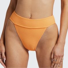 Nwt Billabong Tanlines Aruba Ribbed Bikini Bottom. Pastel Neon Orange. Xl. Color: Orange Peel Description Made Of Recycled Tanlines Rib Fabric, The Aruba Bikini Bottoms Are A High-Waisted Style With A Wide Waistband For Better Support And An Ultra-Flattering, High-Leg Rise. Details & Features Plusminus Tanlines Aruba Bikini Bottoms Style Abjx400768color Code Ngz0 Features Eco-Conscious Fabric: Recycled Polyester Elastane Tan Lines Rib Blend Fabric Fit: Aruba Fit Coverage: Medium Bum Coverage Ris Orange Beachwear Bottoms For Pool, Orange Beachy Swim Bottoms, Orange Beachy Bottoms For Beach Party, Beachy Orange Bottoms For Beach Party, Orange Seamless Swimwear For Sunbathing, Seamless Orange Swimwear For Sunbathing, Fitted Orange Beach Bottoms, High Waist Orange Bottoms For Beach, Orange Seamless Bottoms For Summer