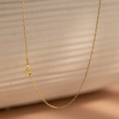 Make a subtle yet personalized statement with our Venice Sideways Initial Necklace, a fashionable accessory that adds a touch of charm to any look. Designed with care and attention to detail, it's the perfect way to showcase your initials or a special letter close to your heart ♡ Material: High Quality Solid 925 Sterling Silver Finish: Sterling Silver ∙ 18K Gold ∙ Rose Gold Dimension: 7mm letter height Design will come in all capital letters unless specified otherwise Size: The total necklace le Adjustable Initial Pendant Name Necklace For Everyday, Trendy Initial Pendant Charm Necklaces, Trendy Everyday Initials Name Necklace, Everyday Trendy Initials Name Necklace, Adjustable Yellow Gold Initials Necklace, Adjustable Yellow Gold Necklaces With Initials, Minimalist Name Charm Necklace With Initial Pendant, Adjustable Initial Pendant Name Necklace, Classic Clavicle Chain Initial Necklace