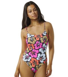 Turn heads with the Hibiscus Heat Cheeky Coverage One Piece. Featuring a flattering silhouette and bold print, this one-piece swimsuit is perfect for making a splash at the beach or by the pool.Features Cheeky coverage All over yardage print Fully lined Adjustable straps Removable padding Metal logo trim Details Fabric: Stretch Recyc Poly Texture Care: Machine washable Country of Origin: Imported Multicolor Floral Print Swimwear For Surfing, Tropical Swimwear With Hibiscus Print, Hawaiian Swimwear With Hibiscus Print For Swimming, Tropical Hibiscus Print Swimwear For Swimming, Pink Hibiscus Print Swimwear For Swimming, Multicolor Hibiscus Print Swimwear For Poolside, Multicolor Hibiscus Print Swimwear For Beach Season, Pink Hibiscus Print Swimwear, Multicolor Hibiscus Print Beachwear Swimwear