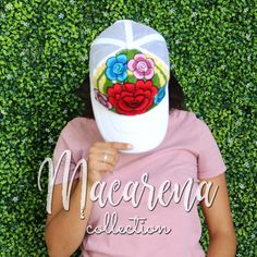 This women's hat is hand embroidered in Mexico. It is a vintage style baseball cap with an adjustable strap in the back. The front is covered in colorful flowers. Each embroidered flower is a bit unique. The hat has a mesh back, making it breathable and comfortable in the warm weather. About Our Items: Each one of our items is handmade/hand woven by Indigenous communities of Chiapas and Oaxaca in Mexico. Great care has been taken to ensure the quality and uniqueness of each item we sell. Our ite White Brimmed Trucker Hat, White Embroidered Trucker Hat, White Embroidered Patch Hat, Handmade Multicolor Trucker Hat, Embroidered Festival Cap, Embroidered Cap For Festival, Embroidered Multicolor Cap, Handmade White Trucker Hat, Custom Embroidered White Hat