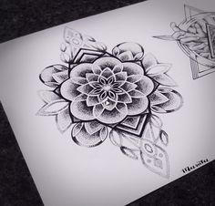 a black and white drawing of a flower with geometric designs on it's petals