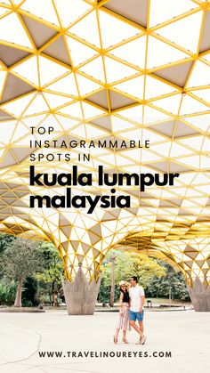 two people walking under a yellow structure with text overlay that reads top instagrammable spots in kuala lump malaysia