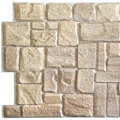 a white brick wall that is made out of stone