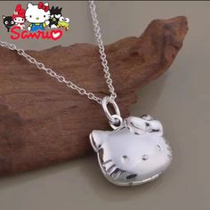 Hello Kitty Silver Locket Necklace Opens To Fit Something Small Like A Photo 925 Stamped New Cute Round Silver Necklace, Hello Kitty Sterling Silver Necklace, Cute Silver Hello Kitty Necklace, Cute Hello Kitty Silver Necklace, Cute Silver Round Charm Necklaces, Cute Silver Round Charm Necklace, Hello Kitty Sterling Silver Jewelry Gift, Sanrio Jewelry, Kawaii Necklace