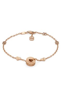 GUCCI Icon 18kt Heart Bracelet Rose Gold YBA729383001.This precious bracelet is presented in 18k rose gold with a delicate chain that features the GG motif. Reflecting the romantic narrative that runs through the House's designs, the piece is defined by an intricate charm with a cut-out heart... Diamond Accessories, Timeless Watches, Bracelet Rose Gold, Rose Gold Charms, Cushion Diamond, Square Diamond, Delicate Chain, Oval Cut Diamond, Princess Diamond