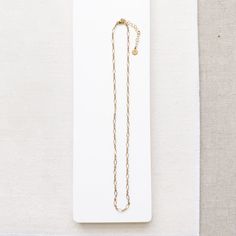 A customer favorite! You will instantly fall in love with the Halo Necklace. The beautiful pattern stands out from all of the other chains. It has a feminine, airy feel. Whether you layer it with other necklaces, let it shine on its own, or add a gemstone or pearl Bijou Charm, The Halo elevates any look. - 16-18 inches & super versatile. 18 inches is a true classic length or wear it closer to 16 inches for a shorter style, sitting closer to the base of the neck. - all pieces are 14K Gold filled Halo Necklace, Let It Shine, Shine On, Base Metal, Beautiful Patterns, Gift Necklace, Fall In Love, Silver Chain, Gold Filled