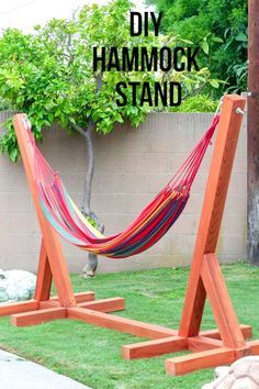 a hammock stand made out of wood and rope with text overlay reading diy hammock stand