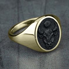 Taurus - The Bull: Independent and self-confident, you are naturally decisive and very determined. You are reliable, charming, balanced, and sometimes stubborn. Your observation skills and problem-solving abilities make you a great judge of character. 16mm oval signet ring 10K Yellow Gold with Tantalum Grey center Available in 2 fits: Luxe and Basic Available in 2 finishes: Satin and Polish Oval Signet Ring, Diamond Frame, The Bull, Ring Shapes, Taurus Zodiac, Round Rings, Swirl Pattern, Oval Pendant, Pinky Ring