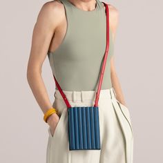 The new Pleated Tool Bag serves up ladylike elegance with structural form, both stand-out stylish and discretely secure for when keeping your valuables close.Featuring extra and adjustable straps, it can be worn three different ways: Slung over the shoulder and torso as a crossbody bag, take on your daytime duties with your essentials strapped close in tow. Glide through the airport with your passport, tickets, and phone at hand’s reach, converting it into a belt bag. Use the smaller strap to se Elegant Rectangular Shoulder Strap For Everyday Use, Modern Shoulder Bag With Long Strap, Chic Rectangular Shoulder Strap For Travel, Modern Shoulder Bag With Arcuate Strap, Modern Crossbody Shoulder Strap For Daily Use, Modern Crossbody Shoulder Strap For Everyday Use, Modern Crossbody Shoulder Strap, Jute Design, Tools Bag