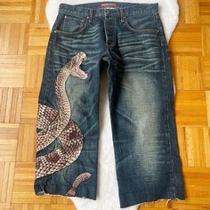 Misplaced Cowboy Snake Embroidered Denim Jeans Size 34 + Snake Is Embroidered On The Jeans + This Are Cut To Be Cropped ( I Think) + No Stains + Please Review Photos For Measurements Embroidered Denim, Colored Denim, Jeans Size, Mens Jeans, Denim Jeans, Cowboy, Cool Outfits, Blue, How To Wear