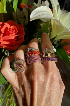 This stunning circle ring features multi-colored pink, orange, and yellow pave cz stones with a unique yellow gold vermeil finish. Colorful Rings Aesthetic, Stacked Rings Aesthetic, Rings Styling, Maximalist Jewelry, Braided Ring Band, Jewel Art, Colored Jewelry, Bath And Body Shop, Layering Necklaces