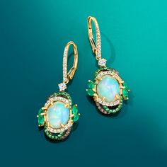 Ross-Simons - Opal Drop Earrings, .64ct t. w. Multicolored Diamonds, .70ct t. w. Multi-Gemstones. Our dreamy drop earrings call to mind the kind of lush greenery found in nature's most enchanting hideaways. Featuring 8x10mm oval opal cabochons that are encircled by artful borders of .64 ct. t. w. brown and white diamonds and .20 ct. t. w. tsavorite rounds with fanciful marquise emeralds that total .50 carats. Set in polished 14kt yellow gold. Hanging length is 1 3/8". Black rhodium at brown diam Opal Drop Earrings, Emerald Birthstone, May Birthday, Fine Jewelery, Lush Greenery, Brown Diamond, Black Rhodium, White Diamonds, Diamond White