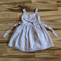 My Daughter Never Wore This Dress. It’s Completely New And So Beautiful. Please Look Through All Of The Pictures. Thank You For Stopping By. Cute Striped Cotton Dress, Striped Spring Dresses For Playtime, Striped Summer Dress For Playtime, Cute Striped Dress For Playtime, Playful Striped Dress For Playdate, Playful Striped Dresses For Playdate, Striped Summer Dresses For Playdate, Multicolor Cotton Sundress For Play, Striped Dresses For Summer Playdate