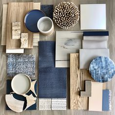 a table topped with lots of different types of furniture and decor items on top of a wooden floor