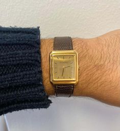 For Sale on 1stDibs - Classy and elegant Tiffany & Co. signed vintage wristwatch. This 18k solid gold and leather strap is for those in search of a classic and sleek timepiece. Classic Rectangular Watch Accessories For Formal Occasions, Yellow Gold Rectangular Watch Accessories With Subdials, Rectangular Yellow Gold Watch Accessories With Subdials, Rectangular Yellow Gold Watch Accessories For Formal Occasions, Formal Rectangular Yellow Gold Watch Bands, Formal Yellow Gold Rectangular Watch Bands, Yellow Gold Business Watch With Rectangular Shape, Yellow Gold Business Watches With Rectangular Shape, Timeless Rectangular Gold Watch Accessories