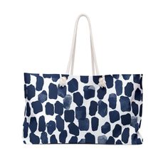 Our Indigo blue and white Beach Tote Bag is perfect for a day at the beach or in town. This wide-mouthed, durable bag holds a generous amount of personal items and is easily held by its thick rope handles. One size: 24" x13" (60.9 cm x 33 cm) 100% Spun Polyester T-bottom Cream sheeting interior lining Assembled in the USA from globally sourced parts   24" × 13" Length, in 24.02 Height, in 12.99 Width, in 5.51 Handle height, in 11.42 Trendy Blue Large Capacity Travel Bag, Trendy Blue Travel Bag With Large Capacity, Blue Casual Travel Bag With Large Capacity, Casual Blue Travel Bag With Large Capacity, Casual Blue Large Capacity Travel Bag, Casual Blue Rectangular Travel Bag, Casual Blue Tote Travel Bag, Blue Rectangular Travel Bag For Daily Use, Everyday Blue Travel Bag, Rectangular