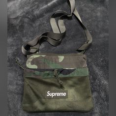 Supreme Camo Side Bag Brand New Enough Space Casual Bags With Flat Pocket For On-the-go, Casual Rectangular Pouch For Errands, Casual Shoulder Bag Pouch For Errands, Functional Satchel Bag With Dust Bag, Functional Satchel With Dust Bag, Functional Satchel With Dust Bag Included, On-the-go Satchel Bag With Flat Pocket, Casual On-the-go Bag With Flat Pocket, Pouch Bags With Zipper Pocket For Errands