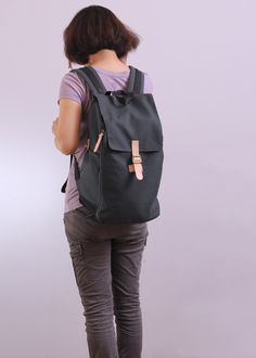 Everyday Canvas Backpack With Functional Pockets, Black Rectangular Canvas Backpack, Commuting Backpack With Pockets, Modern School Backpack With Pockets, Everyday Backpack With Pockets, Everyday Rectangular Backpack With Functional Pockets, Everyday Softback Backpack With Pockets, Practical Everyday Backpack With Pockets, Black Cotton Backpack With Pockets