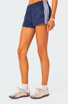 Build your best athleisure looks yet with these swishy, lightweight shorts cut from pure nylon and detailed with sporty stripes at the sides. Elastic waist 100% nylon Machine wash, dry flat Imported Edikted Shorts, Athleisure Looks, Nylon Shorts, Quoi Porter, Skandinavian Fashion, Summer Lookbook, Lightweight Shorts, T B, Mellow Yellow