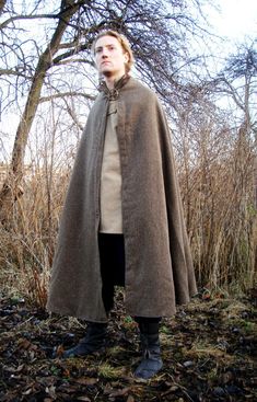 The cloak is one of the most versatile items of clothing for the early medieval reenactors. It is a way to show their high social status. It is useful for protection against the cold. It can keep warm while sleeping. The offered cloak is made of thick wool with a linen lining. This half-circle cloak it is around 140 cm long. It's great for reenacting, for almost every historical period, especially the Middle Ages. Production time is 3 weeks. Delivery time is 1 -2 weeks This offer applies cloak w Medieval Style Outerwear For Costume With Historical Design, Medieval Style Outerwear With Historical Design For Costume, Medieval Style Historical Outerwear Costume, Viking Style Outerwear Costume For Fall, Medieval Style Historical Design Costume Outerwear, Medieval Cape For Cosplay In Fall, Viking Style Fall Costume Outerwear, Viking Costume Outerwear For Fall, Medieval Cape For Cosplay And Fall