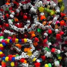 Get a lucky pick of 5 random MCR themed bracelets! Personalized Rave Beaded Bracelets As Gift, Personalized Rave Beaded Bracelet For Gift, Personalized Rave Beaded Bracelets For Gifts, Black Rave Bracelets As Gift, Novelty Bracelets With Letter Beads, Novelty Letter Beads Wristband Bracelet, Assorted Color Bracelets With Letter Beads As A Gift, Assorted Letter Beads Bracelets For Gifts, Assorted Letter Beads Bracelets For Gift