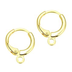 two pairs of gold plated hoop earrings on a white background with clippings