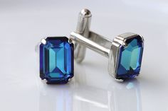 BLUE CUFFLINKS, Blue Sapphire Cufflinks, Groom Cufflinks, best man cufflinks, Royal Blue Suit Gift,  Cufflinks, Father Of The Bride Cufflink THE PRICE IS FOR PAIR  CUFFLINK Details of item: Metal: 24K Gold Plated or silver plated - Nickel Free Gemstone:  - crystals Cuff links Size: 14 mm *10 mm The cuff links will be packed in a gift box. ,  TO GET TO MY ETSY SHOP: https://www.etsy.com/il-en/shop/rebekajewelry THANK YOU FOR CHOOSING MY ETSY SHOP REBEKA Classic Blue Jewelry For Business, Elegant Blue Cufflinks For Gift, Sapphire Cufflinks, Blue Cufflinks, Royal Blue Suit, Groom Cufflinks, Cufflinks Men, Father Of The Bride, Tie Accessories