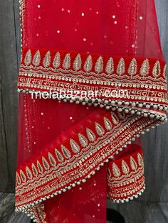 Heavy red bridal dupatta with gold sequins work and beads on the border. Color : Red Red Lehenga With Dupatta In Chinon, Red Lehenga With Resham Embroidery In Chinon, Red Chinon Lehenga With Resham Embroidery, Bollywood Style Red Choli In Chinon, Red Chinon Lehenga For Navratri, Red Bollywood Lehenga In Chinon, Bollywood Style Red Chinon Lehenga, Traditional Red Chinon Choli, Red Chinon Lehenga With Traditional Drape