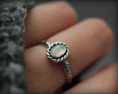 Sold Individually • MADE TO ORDER - please allow for production time • MATERIALS: sterling silver, synthetic opalITEM DETAILS :I designed this beautiful opal ring to have a vintage feel to it. With its beautiful, floral patterned band and oxidation to bring out the textures, it has a bit of a Victorian vibe. I have set a stunning synthetic opal in the color of your choice, that has fiery flashes of color. Photos don't do these opals justice. They are just gorgeous. Because it is cut to your ring Bohemian Opal Ring, Bohemian Opal Promise Ring As Birthstone, Bohemian Opal Promise Ring, Bohemian Opal Promise Ring With Birthstone, Bohemian Opal Birthstone Promise Ring, Bohemian Oval Opal Ring, Antique Sterling Silver Opal Ring, Bohemian Adjustable Opal Ring, Handmade Unique Sterling Silver Opal Ring