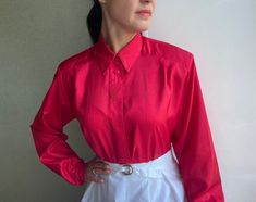 Cute vintage red blouse with long sleeves. Still very wearable this would be a great addition to your summer wardrobe or would be great retro office wear. Material: polyester, but it's comfortable, light and looks like silk😊 Size 44. Please see measurements for best fit: shoulders: from pit to pit: sleeve length: full length: Model is size M and 170 cm growth. **Great Vintage condition! Perfect white! **This item will come to you freshly laundered and ready to wear. **If you want to purchase mo Red Long Sleeve Office Top, Red Long Sleeve Top For Office, Red Long Sleeve Office Shirt, Vintage Red Long Sleeve Top, Elegant Red Long Sleeve Shirt, Elegant Long Sleeve Red Shirt, Vintage Long Sleeve Office Tops, Vintage Red Long Sleeve Blouse, Vintage Long Sleeve Tops For Office