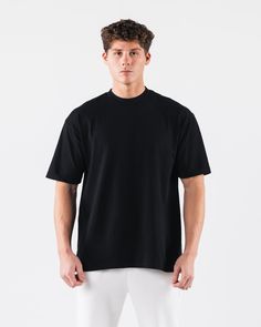 HIGHLIGHTS Oversized fit Hypo-allergenic & shrink free Enzyme washed for broken in feel High neck w/ ribbed collar. Manufactured in USA FIT SUGGESTION. This item runs true to Alphalete’s oversized fit.. Male model is. 6’2”/188cm, wearing a size L with a 44”/109.2cm. chest. Female model is 5'7"/170cm, wearing a size M with a 38.5"/97.8cm bust. MATERIALS AND WASHING DIRECTIONS. 100% 6.5 Oz Cotton We recommend washing inside-out on a cold setting. Hang to dry. Introducing our Pump Covers - the perf Pump Covers, Female Model, Favorite Shirts, Male Model, Oversized Fits, Black Tee, Black Tshirt, High Neck, How To Wear