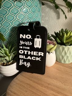 You need a funny luggage tag. You'll never lose your bag in the carousel again with the bright tags. This is the perfect gift for a fellow traveler as well! All tags will come with white vinyl.  Each tag has a plastic covered card to put an address that is hidden under a snapped strap. the design is put on with high quality heat transfer vinyl.  How to order: 1. Choose between Orange, brown, red, black, pink, yellow, or black. 2. Pick your design choice. Black Luggage Tag With Luggage Sleeve For Travel, Black Rectangular Luggage Tag With Sleeve, Black Rectangular Luggage Tag For Travel, Personalized White Luggage Tag For Travel, Black Rectangular Luggage Tag For School, Black Rectangular Luggage Tag For Weekend Trips, Personalized Black Luggage Tag For Travel, White Rectangular Luggage Tag For Travel, Diy Bag Tags