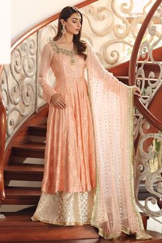 Anarkali Style Floor-length Peach Sharara, Anarkali Style Peach Floor-length Sharara, Floor-length Peach Anarkali Sharara, Orange Sharara With Sheer Dupatta For Eid, Peach Anarkali Set For Designer Wear, Peach Sharara With Dabka Work For Weddings, Peach Semi-stitched Floor-length Sets, Peach Sharara With Sheer Dupatta, Pink Naqshi Lehenga