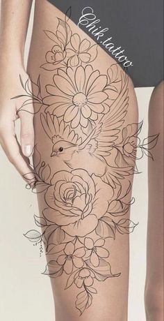 a woman's thigh with flowers on it