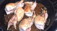 chicken cooking in a skillet on the stove