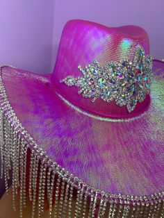 Handmade fun festival style cowgirl hat Gold tear drop sequin dangle trim, with gold embellished stars on an iridescent pink cowboy hat Great for festivals, concerts, parties One Size fits all - Adults Cowboy hat / cowgirl hat / embellished hat / white hat / fluffy hat / fur hat / bridal hat / Bride Hat Boxed delivery via courier Cowgirl Rave Outfit, Rave Party Outfit, Cowgirl Disco, Cosmic Cowgirl, Fluffy Hat, Pink Cowboy Hat, Pink Cowboy, Bride Hat, Bridal Hat