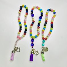 Kids Tasbih, Rainbow tasbih, Tasbih charm, Silver inlet beads, Ramadan Eid Gift for children, Tasbeeh for children, Muslim prayer beads gift These Arabian acrylic prayer beads can be used by all religions. Bibi Fatema prayer beads make the perfect Islamic gift or Eid gift idea for your loved ones, even for a baaligha or an aameen. The acrylic beads are great quality and easy to move from bead to bead. This tesbih would be great as an Eid gift, for meditation, as a car hanging or even as a tasbee Multicolor 8mm Beads Rosary Bracelet As Gift, Multicolor 8mm Bead Rosary Bracelet Gift, Multicolor Rosary Bracelet With 8mm Beads As Gift, Colorful Beads Rosary As Gift, Multicolor Handmade Rosary As Gift, Handmade Multicolor Rosary As A Gift, Handmade Multicolor Rosary As Gift, Multicolor Rosary Bracelet With Colorful Beads As Gift, Multicolor Beaded Rosary As Gift