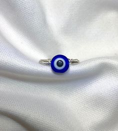 This is a evil eye ring that does not tarnish!  Remember to select your exact ring size  *Great for birthday gifts, Wedding Gifts, and Xmas gifts to Loved Ones! (Everything Nickel Free) If you have any questions feel free to message me I ship orders the next day so you get your package faster! Each order will be shipped with good care and protection, making sure your order gets to you in perfect condition I always throw in free gifts for customers when you order from me :) Gifts For Customers, Evil Eye Rings, Eye Rings, Evil Eye Ring, Eye Ring, Gifts Wedding, Xmas Gifts, Rings Statement, Evil Eye