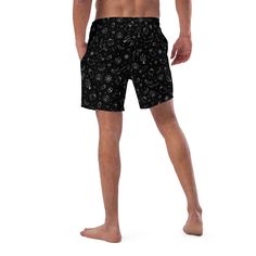 Dive into summer darkness with Goth Cloth Co.'s Gothic Halloween Swim Trunks. Featuring a haunting pattern of ghosts, pumpkins, black cats, and spider webs against a black and white backdrop, these trunks combine gothic elegance and Halloween flair, perfect for the darkly inclined beachgoer. Key Features: Four-way stretch fabric: Water-repellent microfiber made from 91% recycled polyester, 9% spandex. Anti-chafe liner: Silky 92% polyester, 8% spandex inner liner for all-day comfort. Multiple poc Fitted Black Witchy Bottoms, Black Emo Style Bottoms For Summer, Black Bottoms For Summer Costume Party, Black Bottoms For Costume Parties In Summer, Gothic Black Bottoms For Costume Party, Black Rave Bottoms For Beach, Black Gothic Bottoms For Costume Party, Gothic Black Bottoms For Halloween, Black Rave Bottoms For Halloween