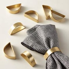 PRICES MAY VARY. 【Simple and Modernist】-- Our gold napkin ring has the modernist style of a set of the semicircle and looks fantastic paired with other stainless steel table accessories. Gleaming metal wraps gracefully around a cloth napkin,these geometric napkin rings looks simple and clean and bring a new table setting for your holiday or family dinner. 【Study Material & Handcraft】-- Made from stainless iron and polished to a gold finish. The semicircle of brushed gold hugs table textiles with Modern Napkin Rings, Napkin Holder Rings, Gingham Napkins, Gold Napkin Rings, Napkin Rings Diy, White Linen Napkins, Gold Napkins, Pink Napkins, Diy Napkins