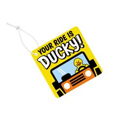 a yellow luggage tag that says your ride is ducky