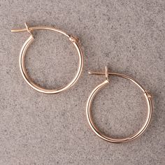 Timeless and chic, these 14k rose gold huggie hoop earrings are easy to wear and compliment existing jewelry that you wear everyday! They are finished with a snap and bar closure. Measuring 12.5mm these hoops can stand alone or be paired up with studs to elevate your look! The items comes packaged and ready for gift giving! Fabrication and Shipping:Please allow 5-10 business days before shipment of these earrings. We use USPS Priority mail for domestic orders which has a delivery time of 2-3 bus Classic Small Hoop Rose Gold Huggie Earrings, Classic Rose Gold Small Hoop Huggie Earrings, Classic Rose Gold Huggie Hoop Earrings, Classic Hypoallergenic Rose Gold Huggie Earrings, Classic Rose Gold Hypoallergenic Huggie Earrings, Classic Rose Gold Huggie Earrings, Rose Gold Tarnish Resistant Huggie Earrings, Classic Hypoallergenic Rose Gold Hoop Earrings, Minimalist 14k Rose Gold Huggie Earrings